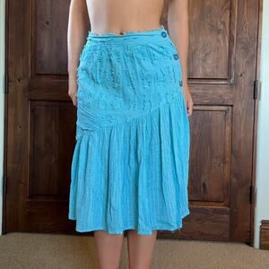 Blue midi skirt with big buttons